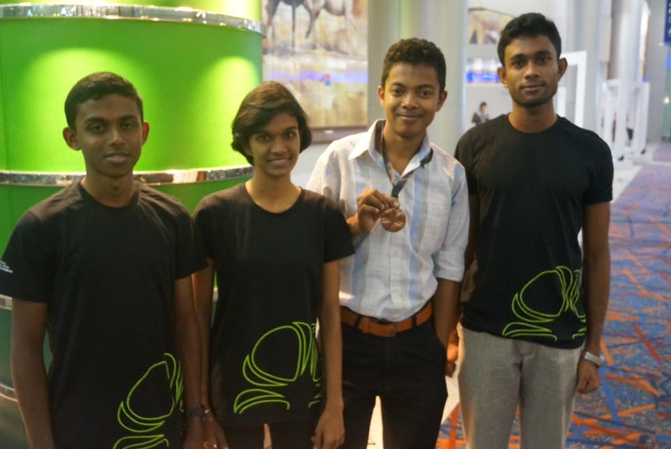 Sri Lankan students with Medal winner sharaka